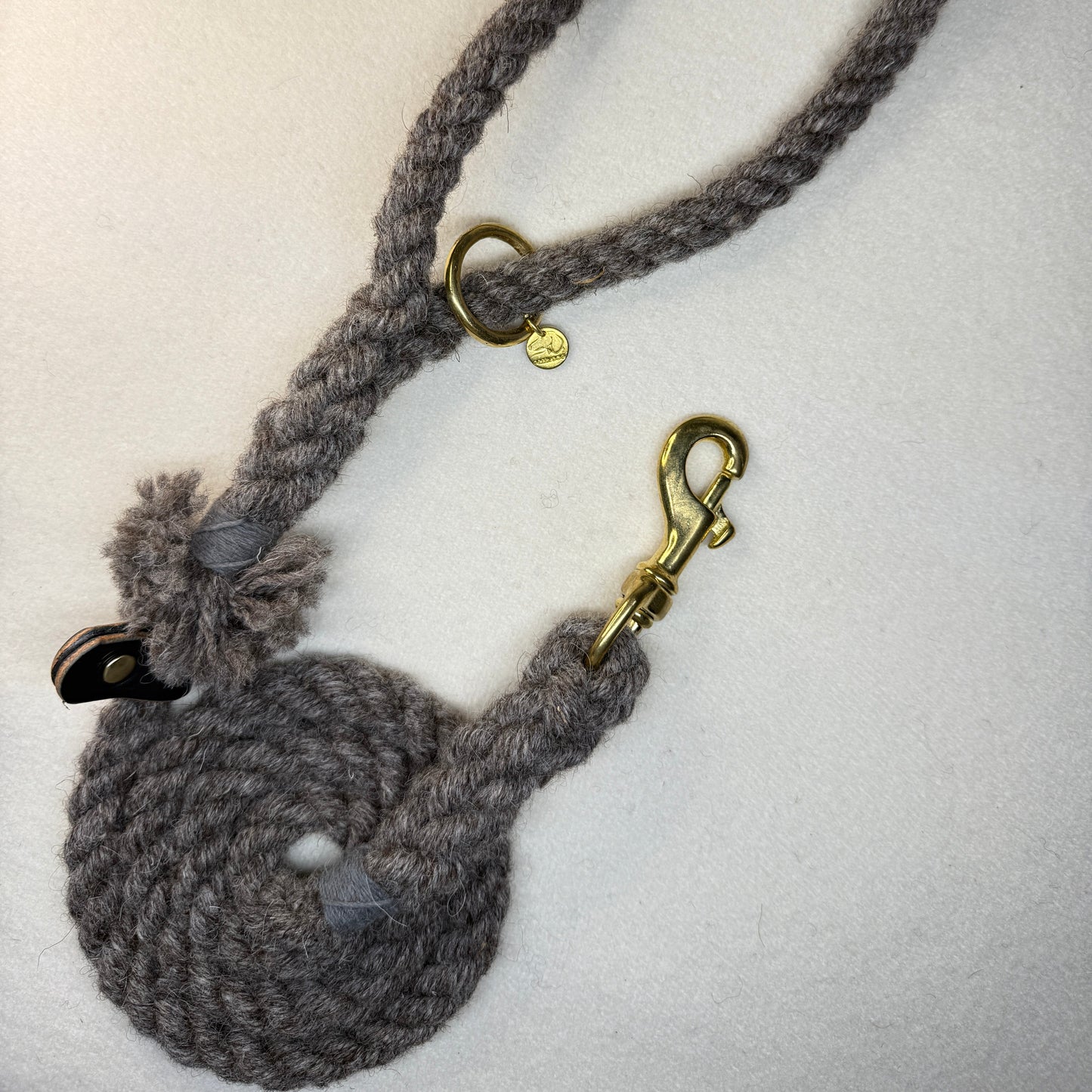 Brampton wool rope dog lead with brass hardware and black bridle leather