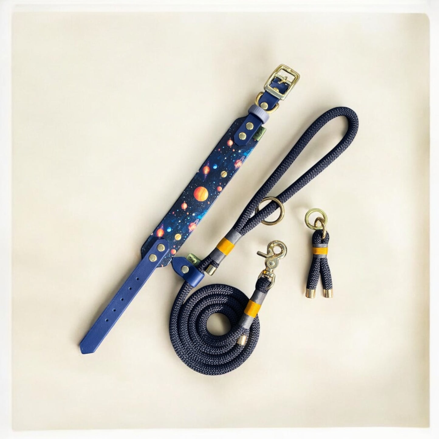 Space Monkey Dog Collar next to the Greenwich Yarn Classic Rope Lead and keychain, part of Monkey's latest collection