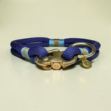 Marine blue rope dog collar with Carolina blue and beige nano cord binding and solid brass clasp and O-ring