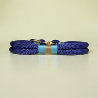 Close-up of Carolina blue and beige nano cord binding on the Marina Edition rope dog collar