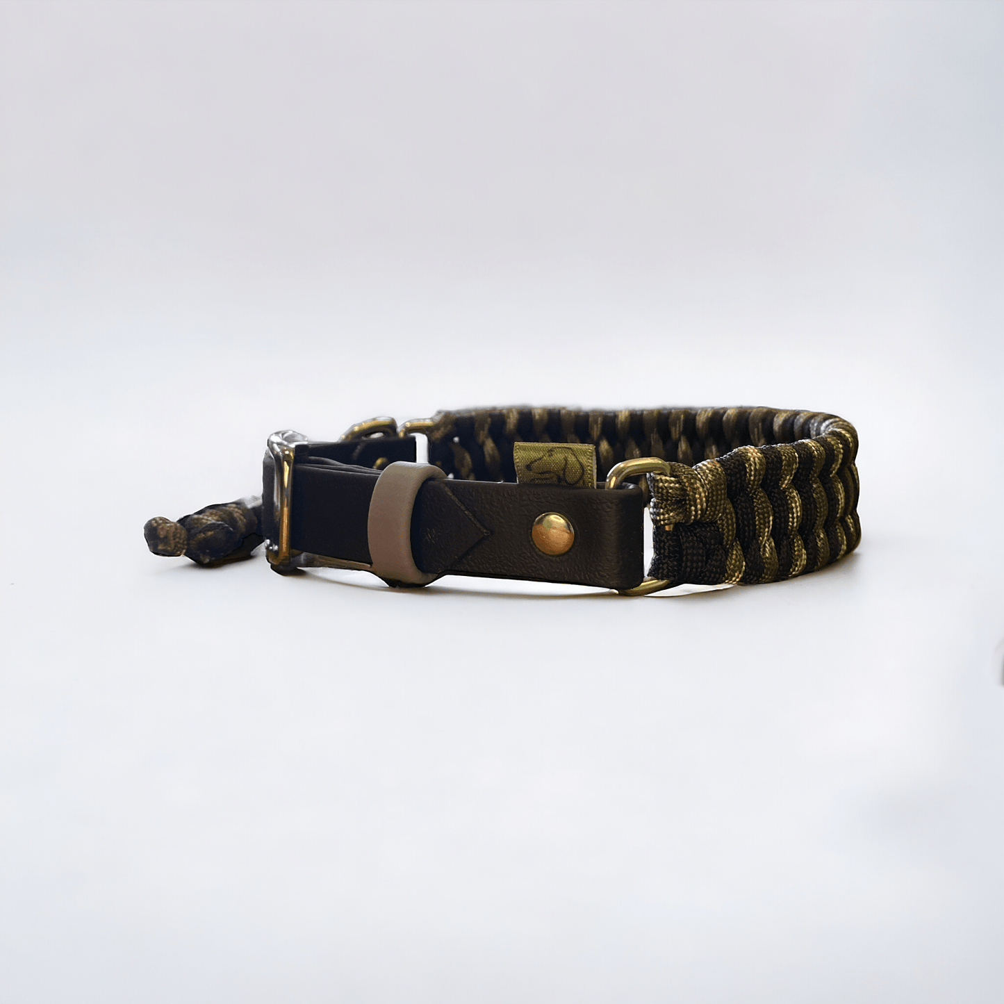 Adjustable cord dog collar in black and camo cords with a black BioThane adjustable strap from the Black Camo set.