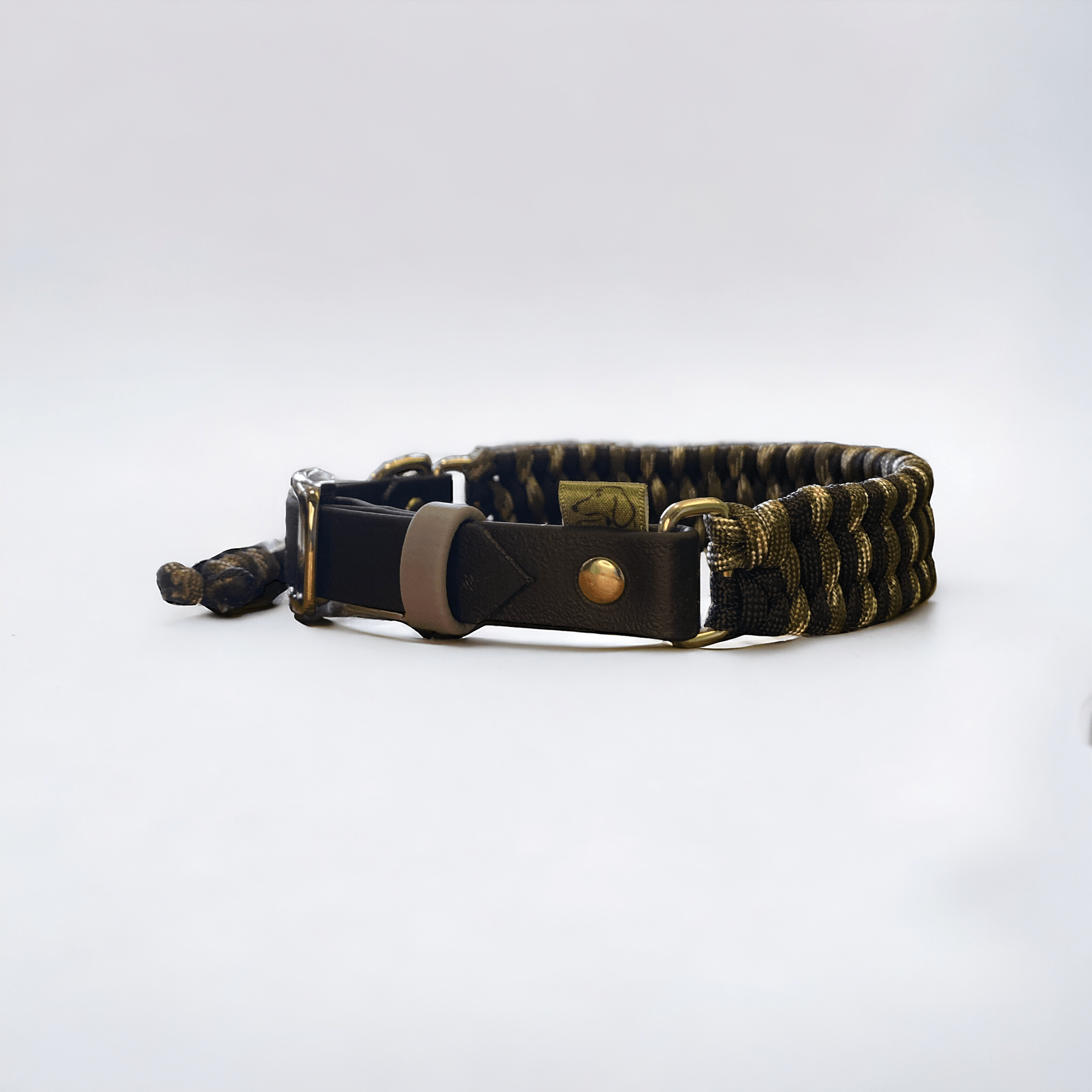 Adjustable cord dog collar in black and camo cords with a black BioThane adjustable strap from the Black Camo set.