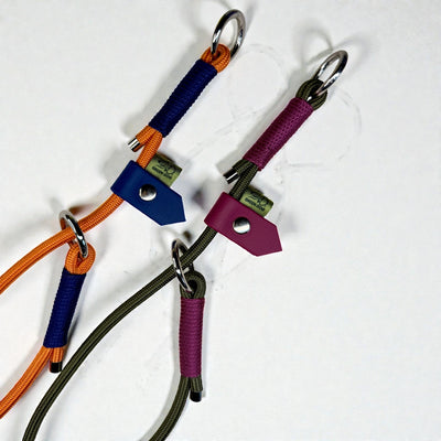 2 slip collars in olive drab and burnt orange 6mm climbing rope with complimentary maroon and dark blue binding and stoppers