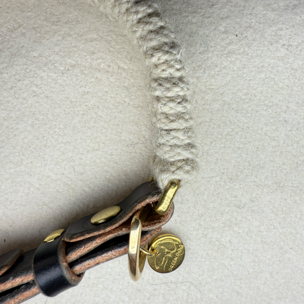 a side arial profile of the Dingley wool rope dog collar with brass hardware and black bridle leather collar adjuster