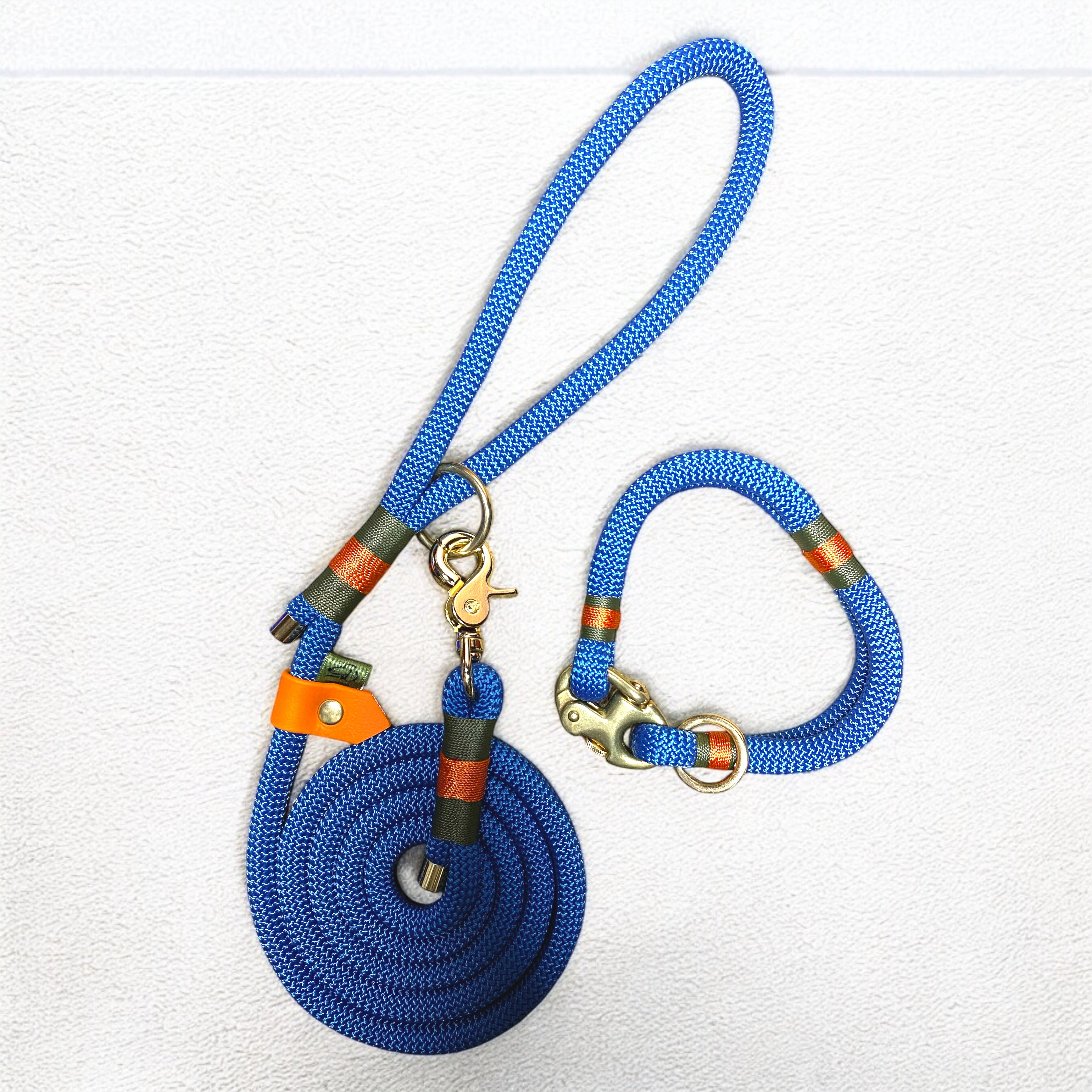 Greenwich Yarn Soho Edition Set made from petrol blue 10mm rope with olive drab and burnt orange bindingand brass hardware