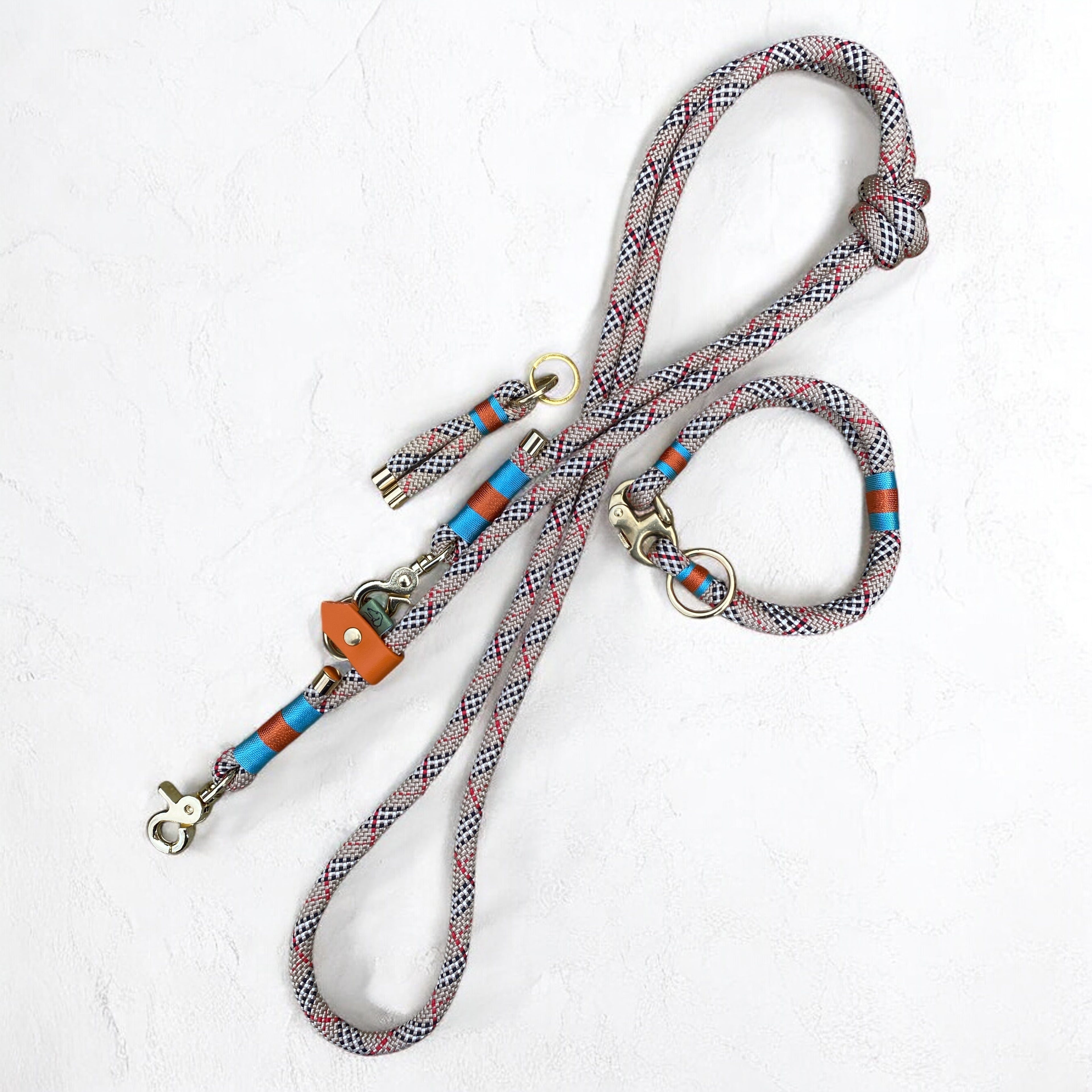 Greenwich Yarn Rope Dog Collar  Bloomsbury Edition set, handmade in the bloomsbury edition colours. Tartan rope, carolina blue and burnt orange binding with brass hardware