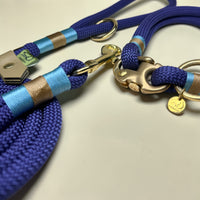 Side view of the Marina Edition marine blue rope dog collar with brass clasp and O-ring