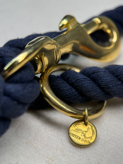Close up of the midnight blue braided cotton rope dog lead with brass detail