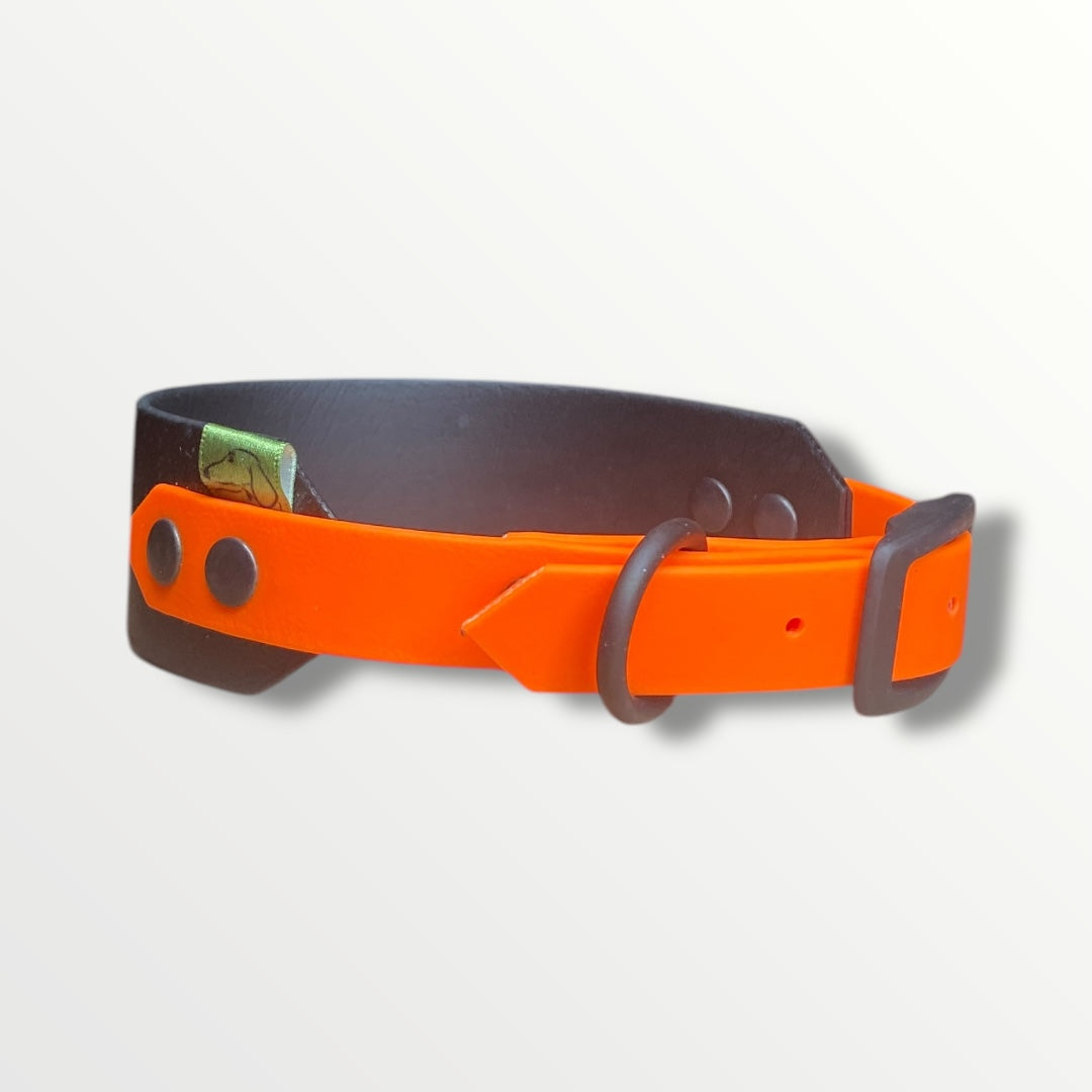 Cotswold Rambler Sighthound Collar with a Black main body and Neon Orange adjustable strap, featuring black silicone-coated hardware.