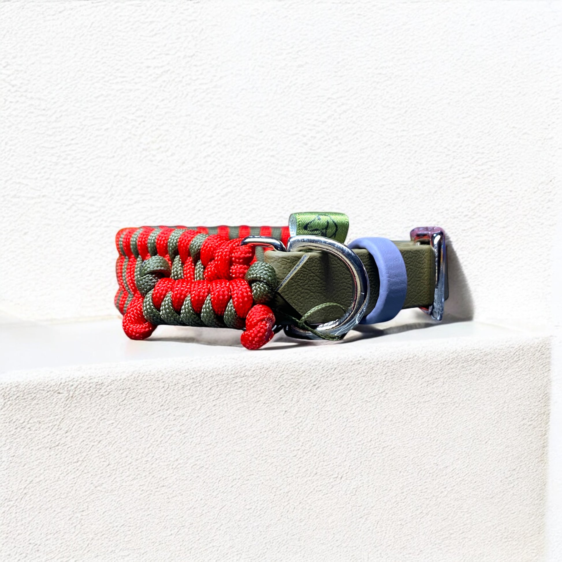 Adjustable cord dog collar in poppy red and army green with a military olive BioThane adjustable strap from the Ranger Red set.