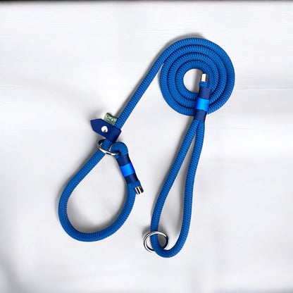 Full view of the Sunny Sky Slip Lead for Dogs, featuring Petrol Blue 10mm rope with navy and blue nano bindings, nickel hardware, and navy BioThane slider.