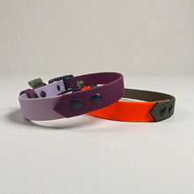BioThane dog collars in Pastel Purple and Maroon, plus Neon Orange and Military Green, with black hardware, back detail view.