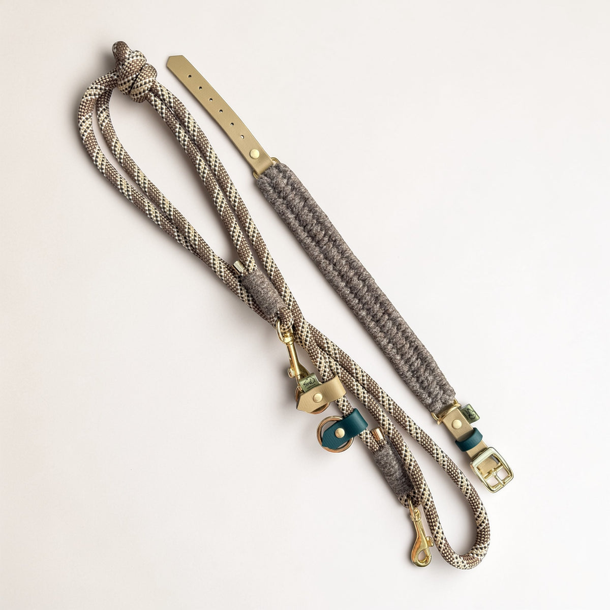 Flat lay of the Brampton Hybrid collar and chestnut rope lead set — Sheep Shed Hybrid collection, grey Brampton wool, beige and teal BioThane detailing, solid brass hardware, handmade in Oxford by Green Dog