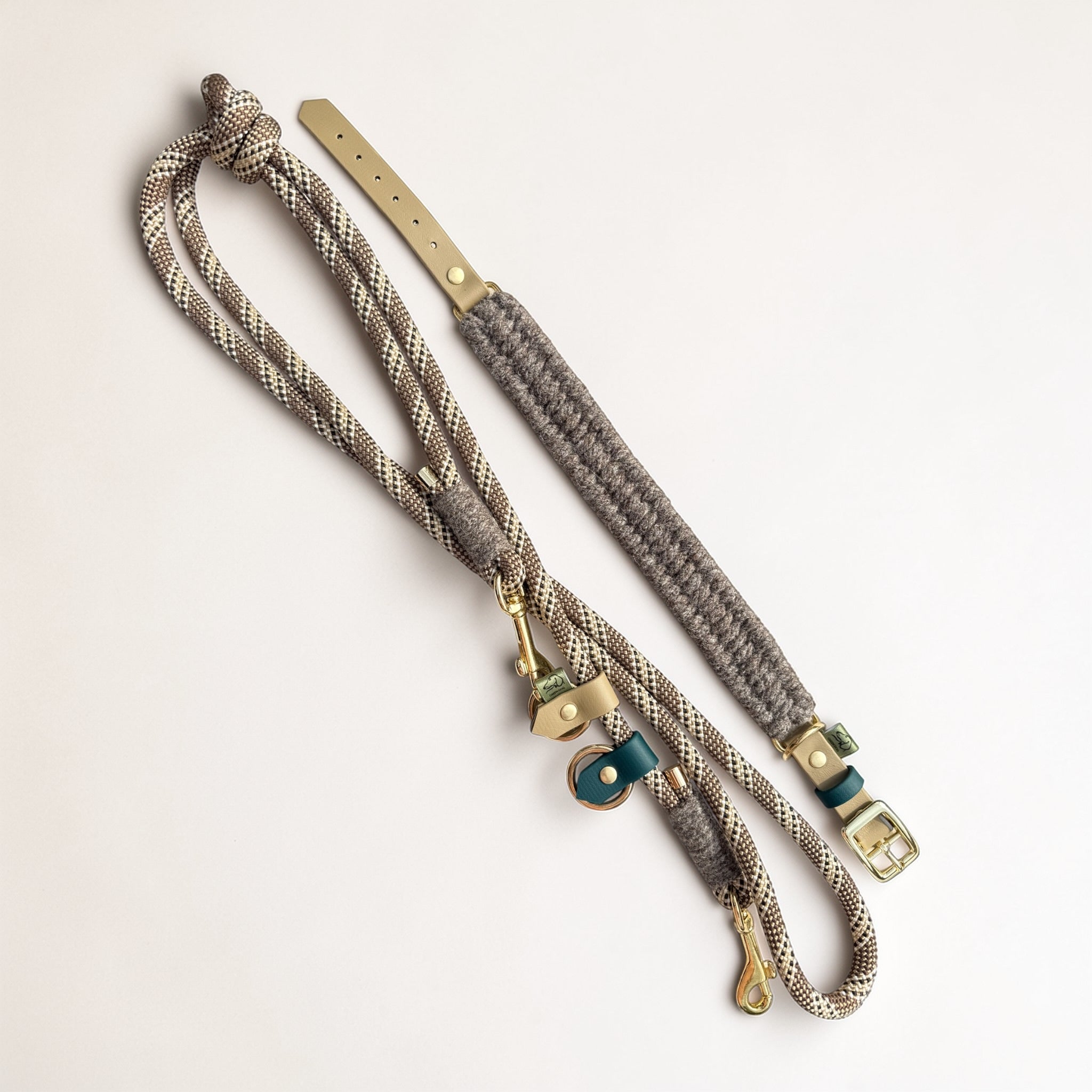 Flat lay of the Brampton Hybrid collar and chestnut rope lead set — Sheep Shed Hybrid collection, grey Brampton wool, beige and teal BioThane detailing, solid brass hardware, handmade in Oxford by Green Dog